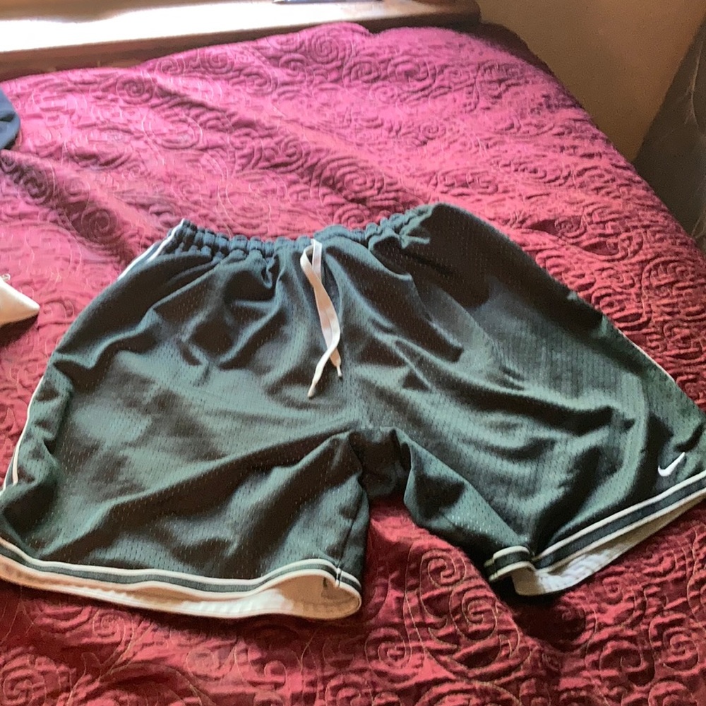 Grey Nike sport shorts.